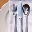 plate with knives, fork and spoon